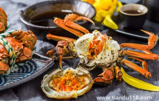 柿子和螃蟹一起吃會中毒嗎（柿子和螃蟹間隔多久吃好）